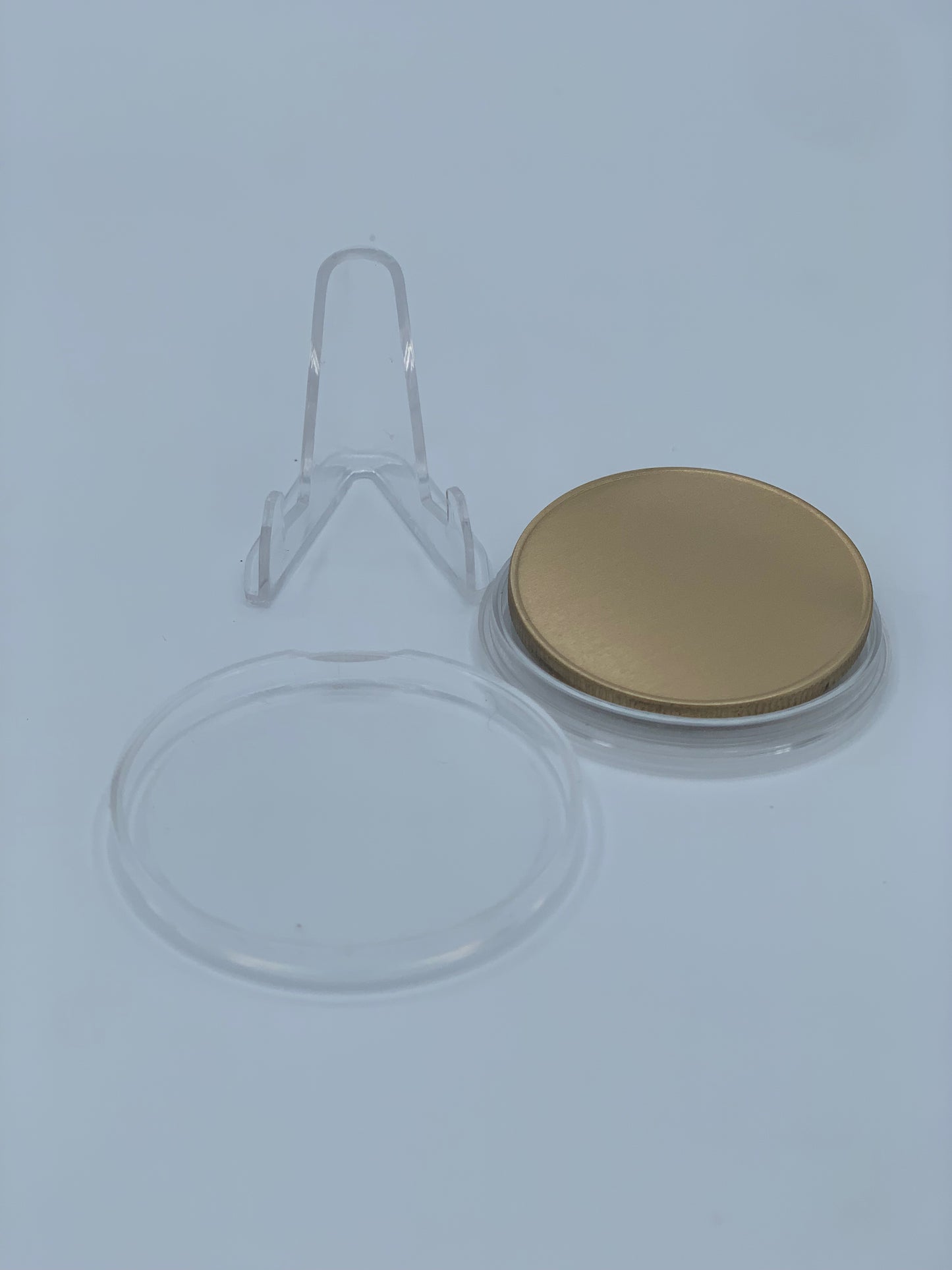 40 mm brass challenge coin with clear protective case and acrylic display stand