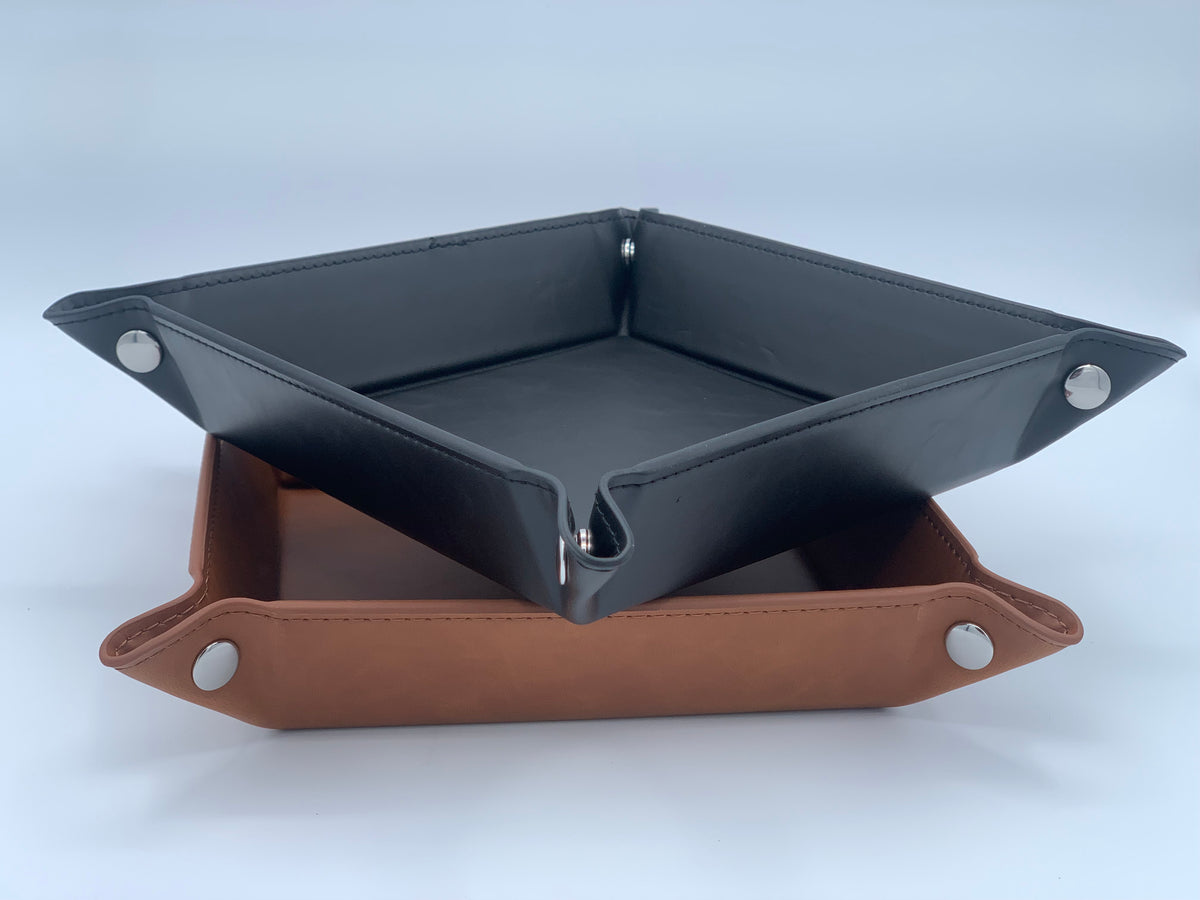 Black and Rawhide snap-corner valet trays shown together to compare color and assembled construction.