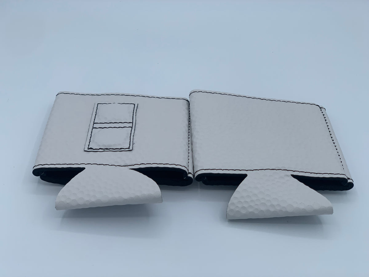 White Golf Ball Textured magnetic can coolers shown open to display the built-in dual-magnet construction.