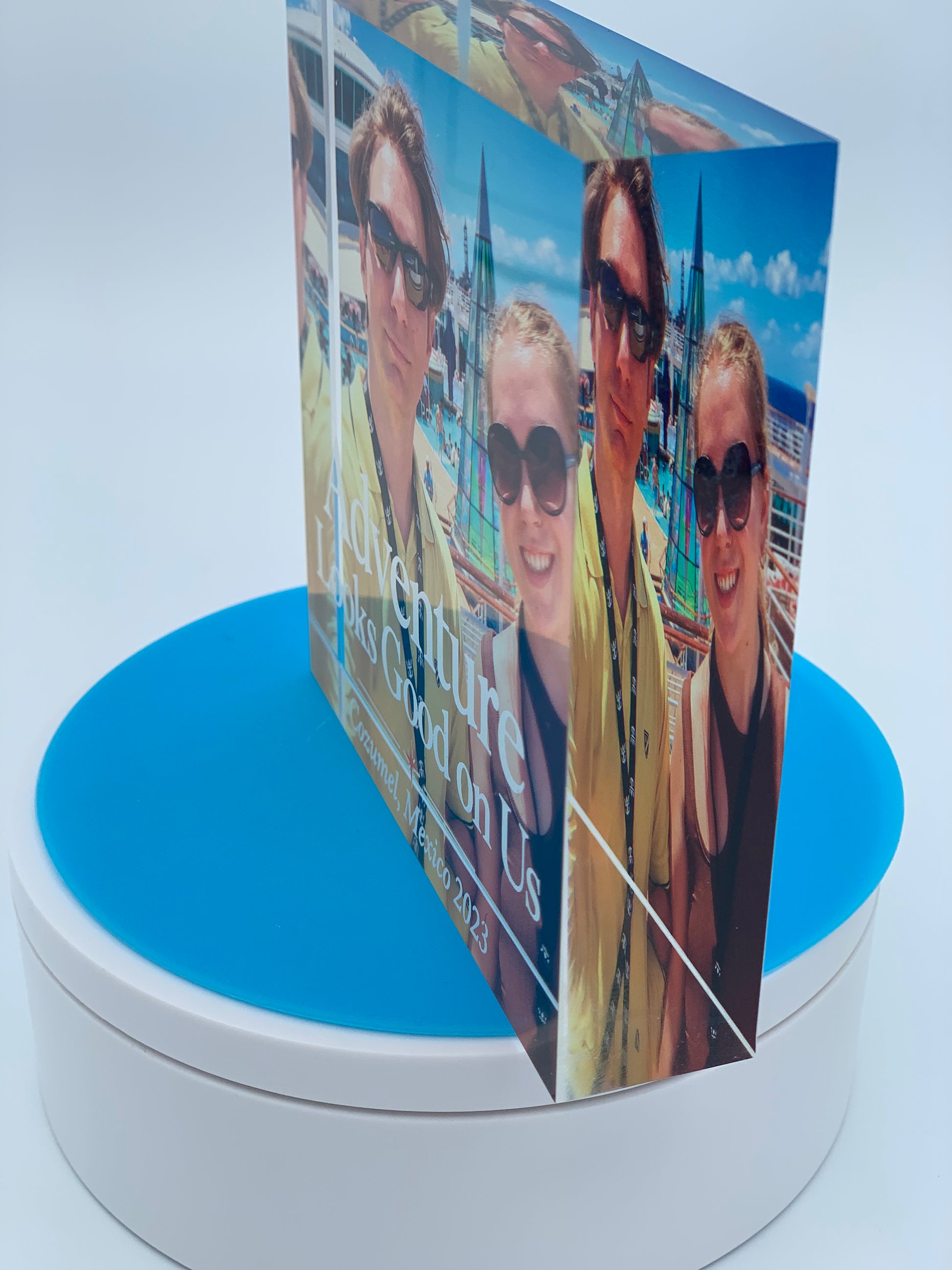 Side view of 4 by 4 inch personalized acrylic display block showing 1 inch thickness