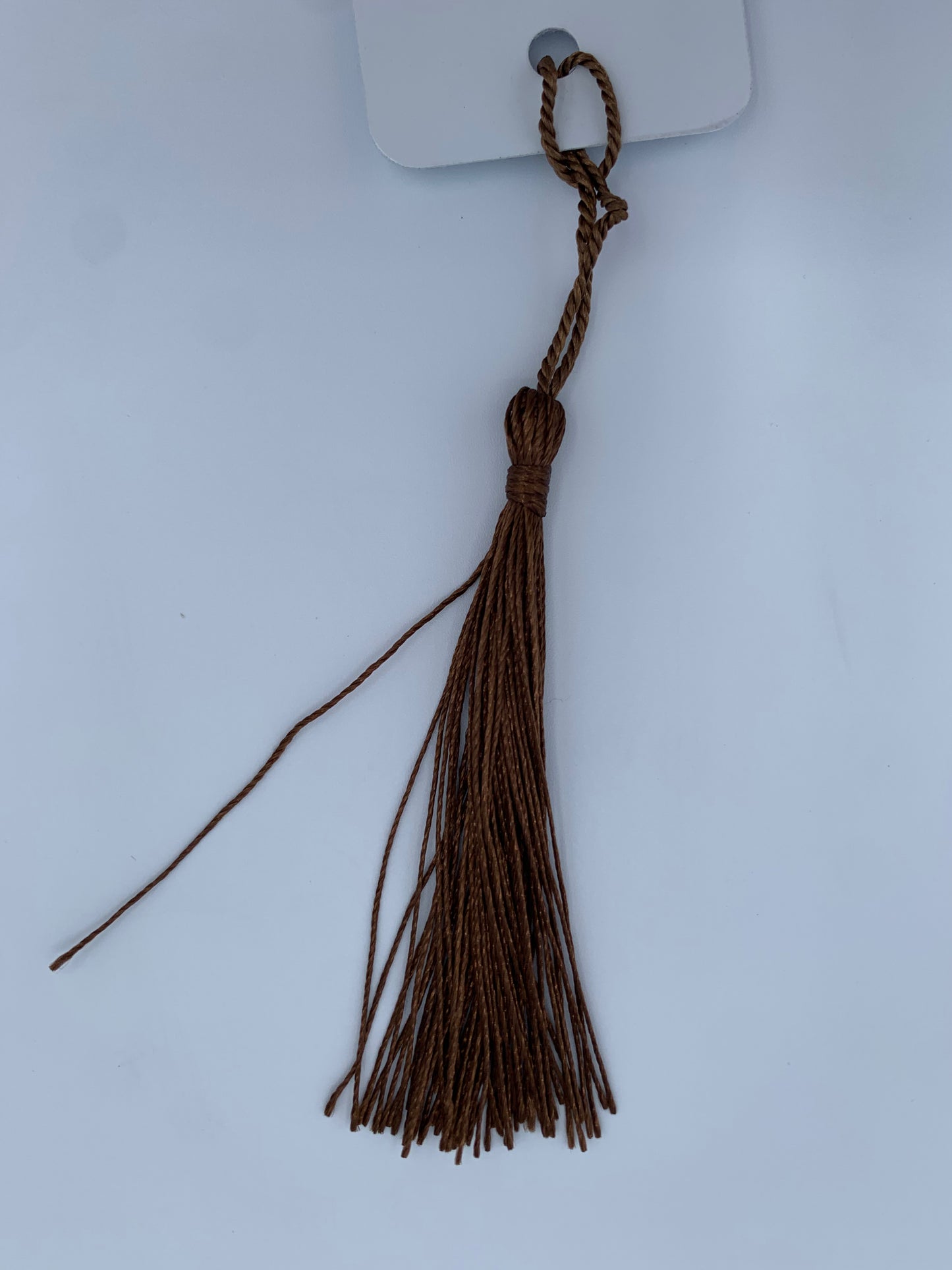 Aluminum bookmark with coffee brown tassel