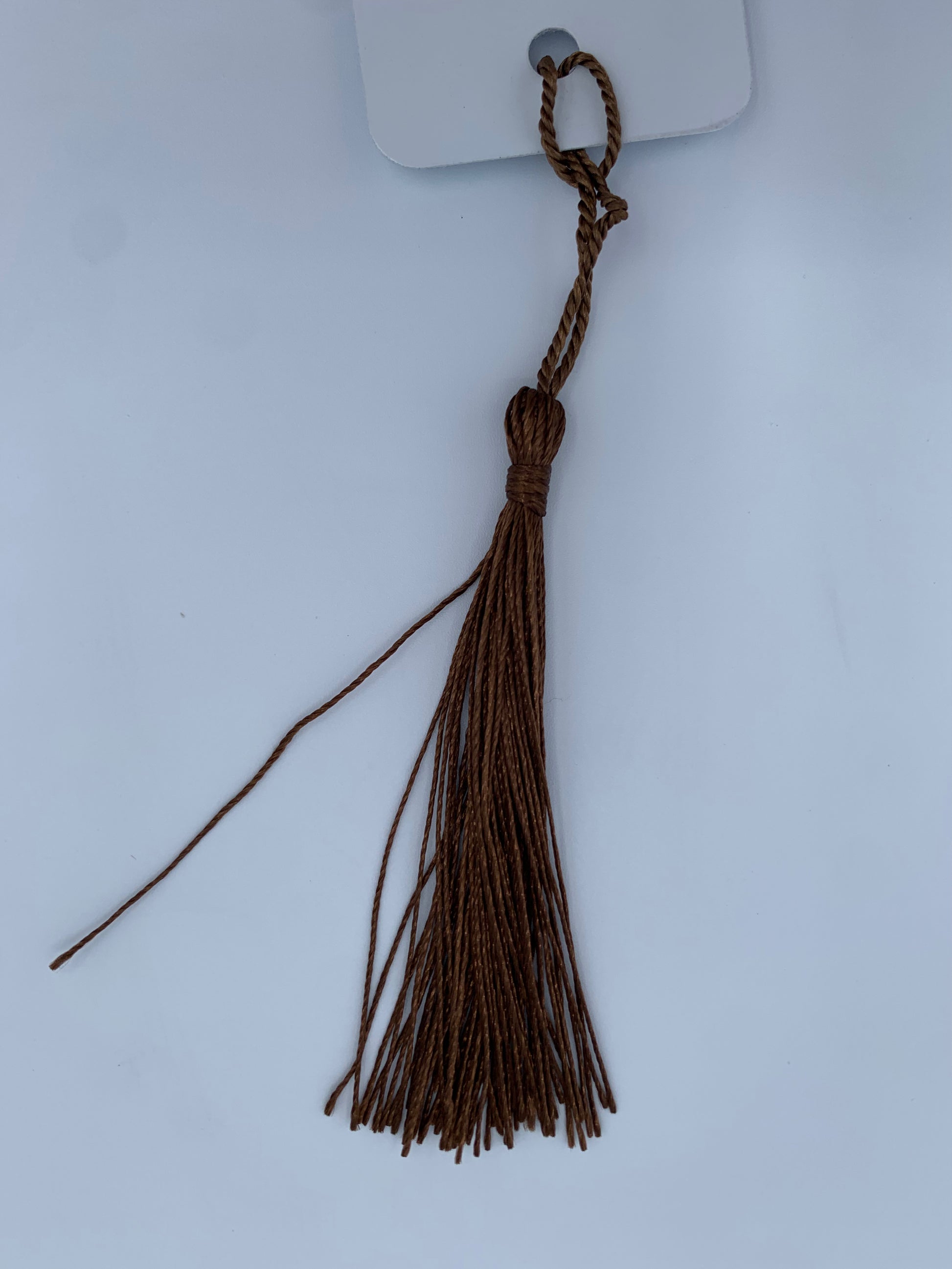Aluminum bookmark with coffee brown tassel
