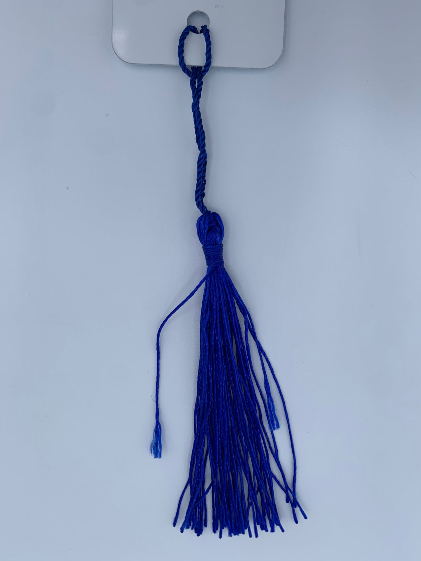 Aluminum bookmark with dark blue tassel