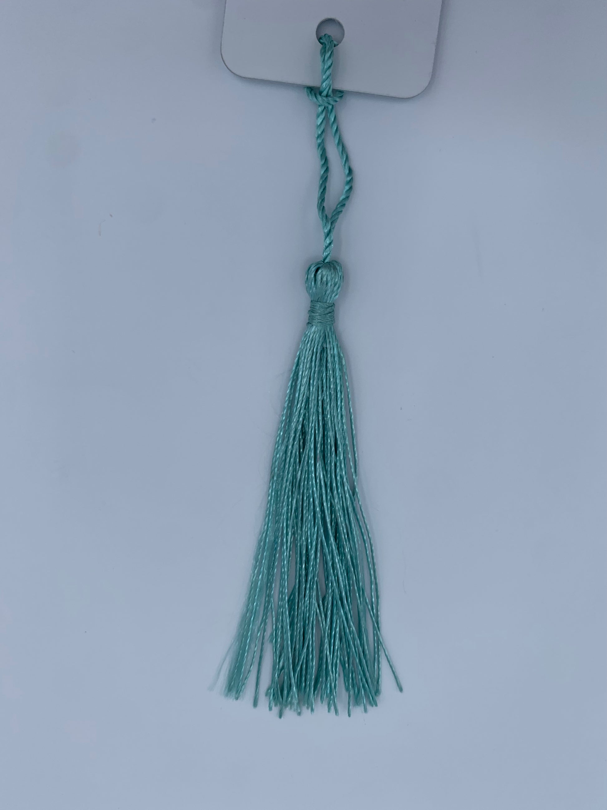 Aluminum bookmark with light blue tassel