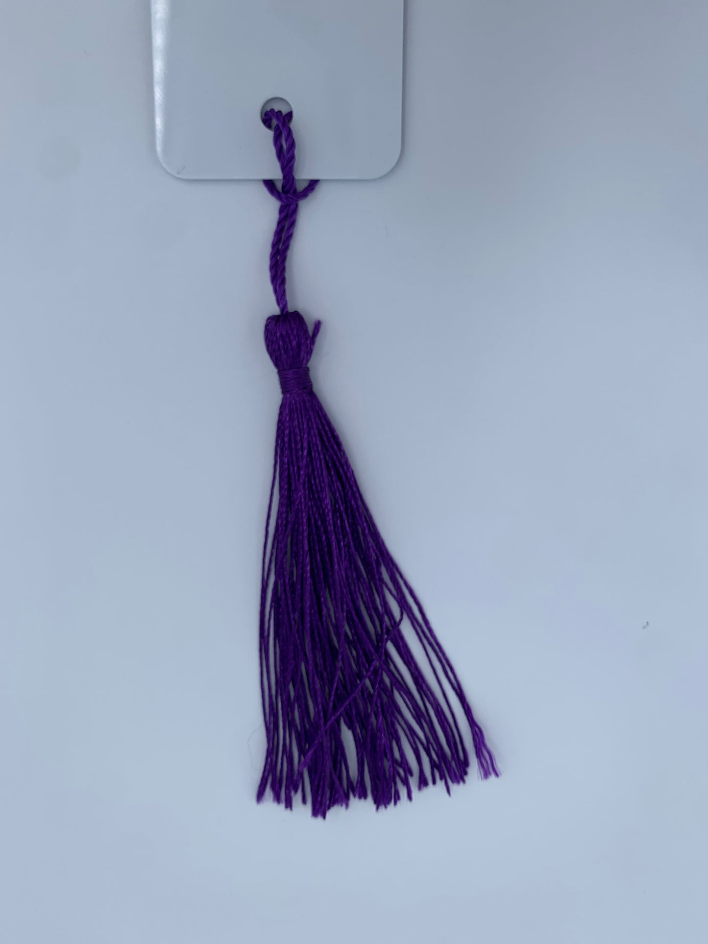 Aluminum bookmark with purple tassel