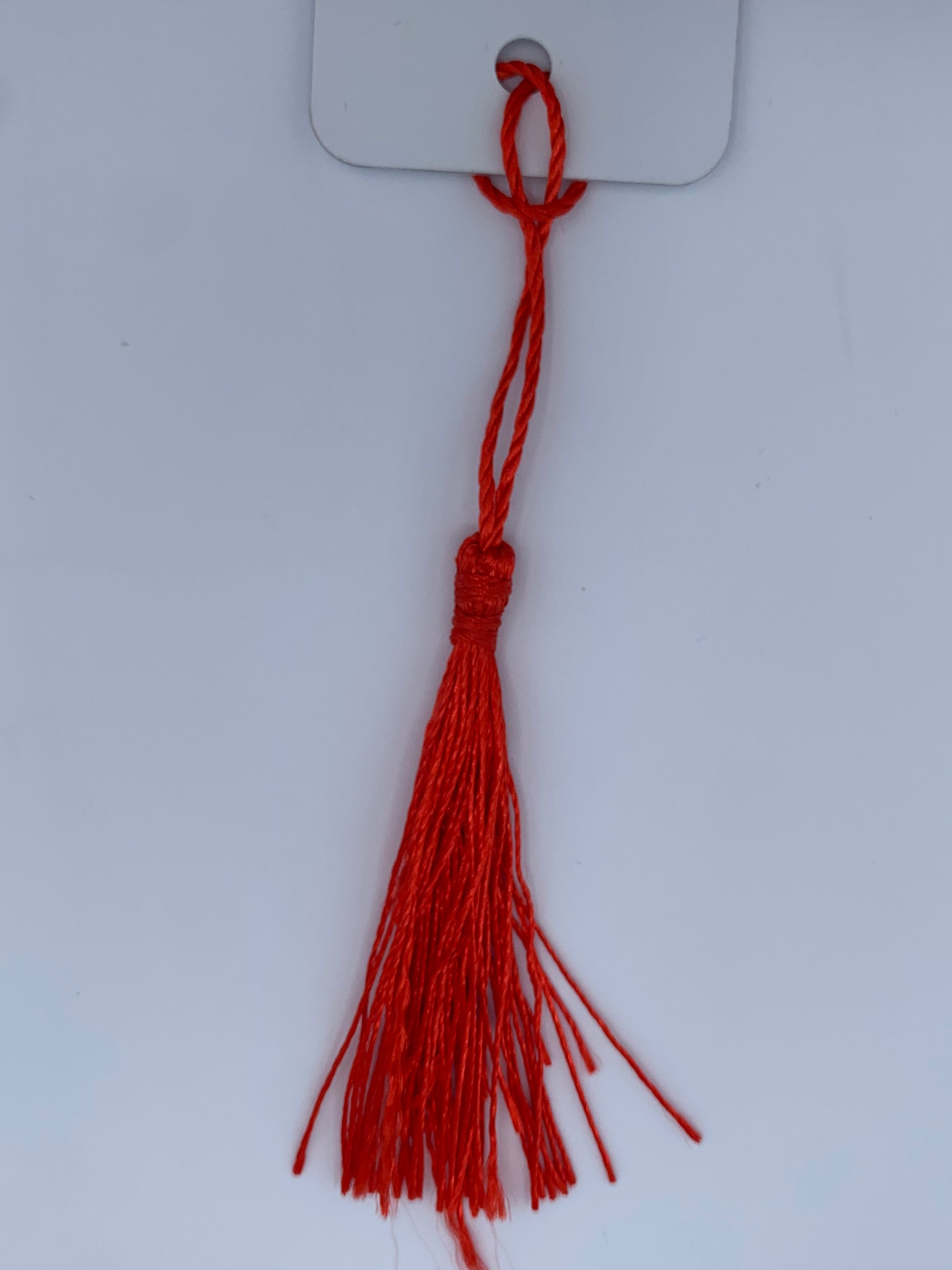 Aluminum bookmark with red tassel