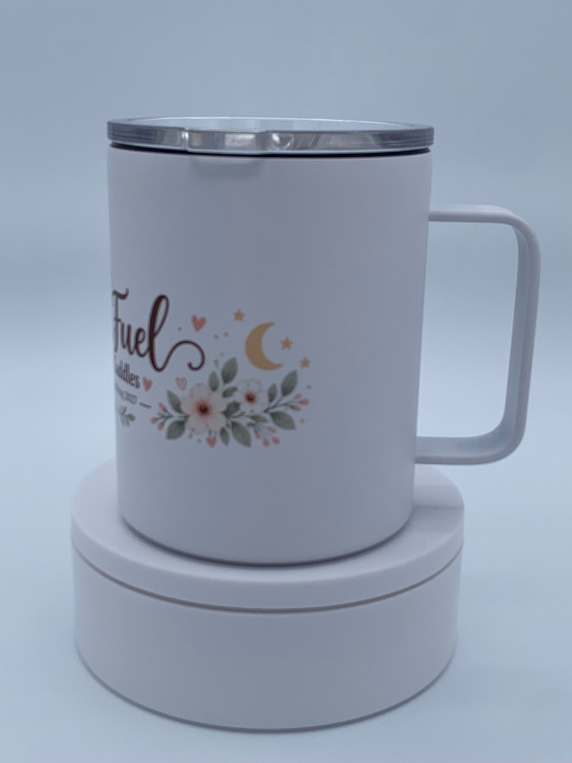 Personalized white 12 oz camper mug showing the handle, profile, and custom printed design.