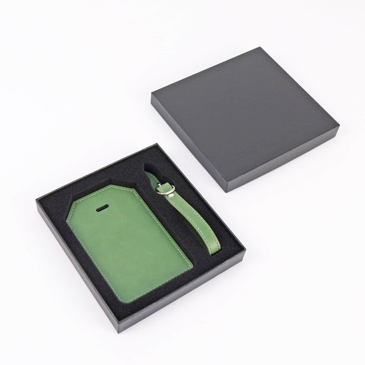 Sage Green leatherette luggage tag with privacy flap and strap ready for personalization.