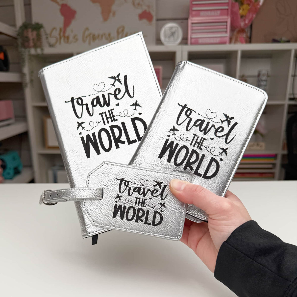Coordinating personalized passport wallets and luggage tag for a matching travel set.
