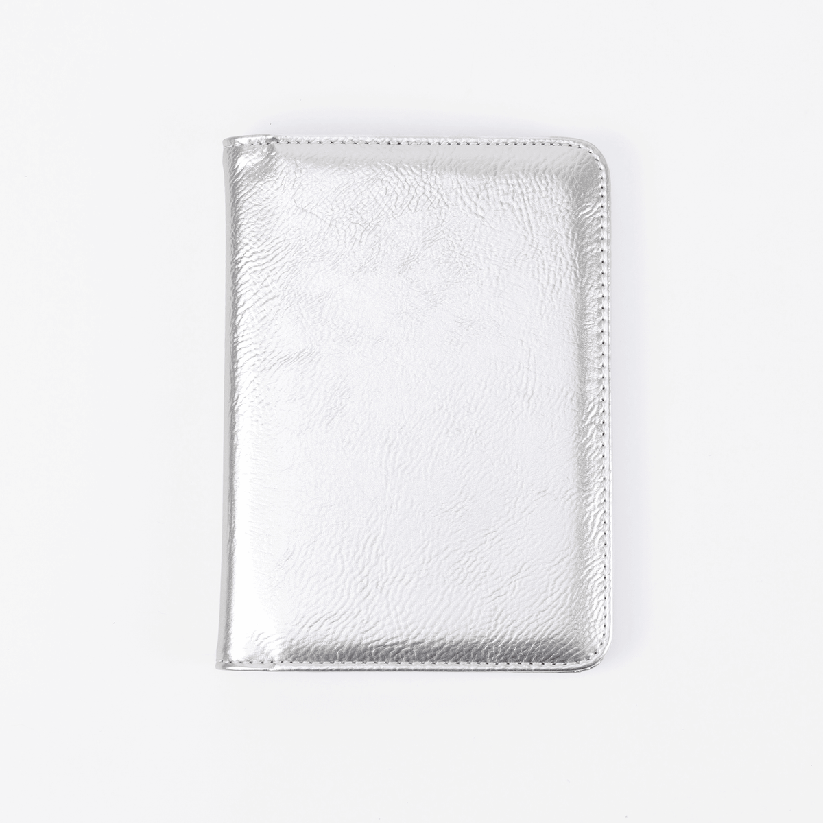 Metallic Silver RFID-blocking passport wallet Signature Finish ready for personalization.