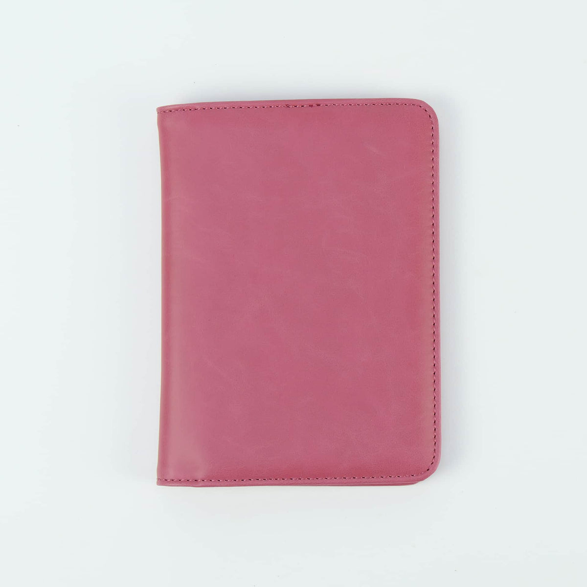 Primrose Pink leatherette RFID-blocking passport wallet ready for personalization.